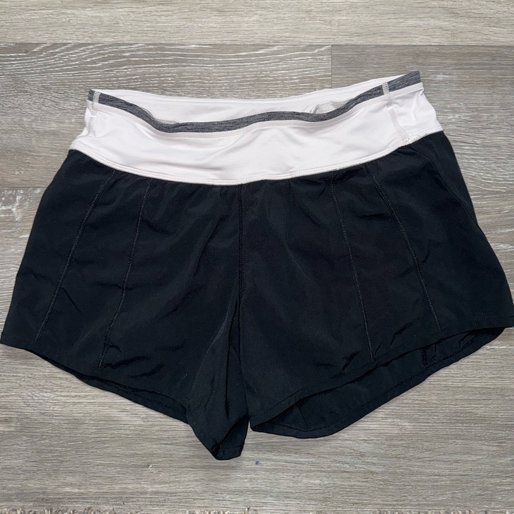 Lululemon Shorts Size 4 Black Light Pink Waist Band Running